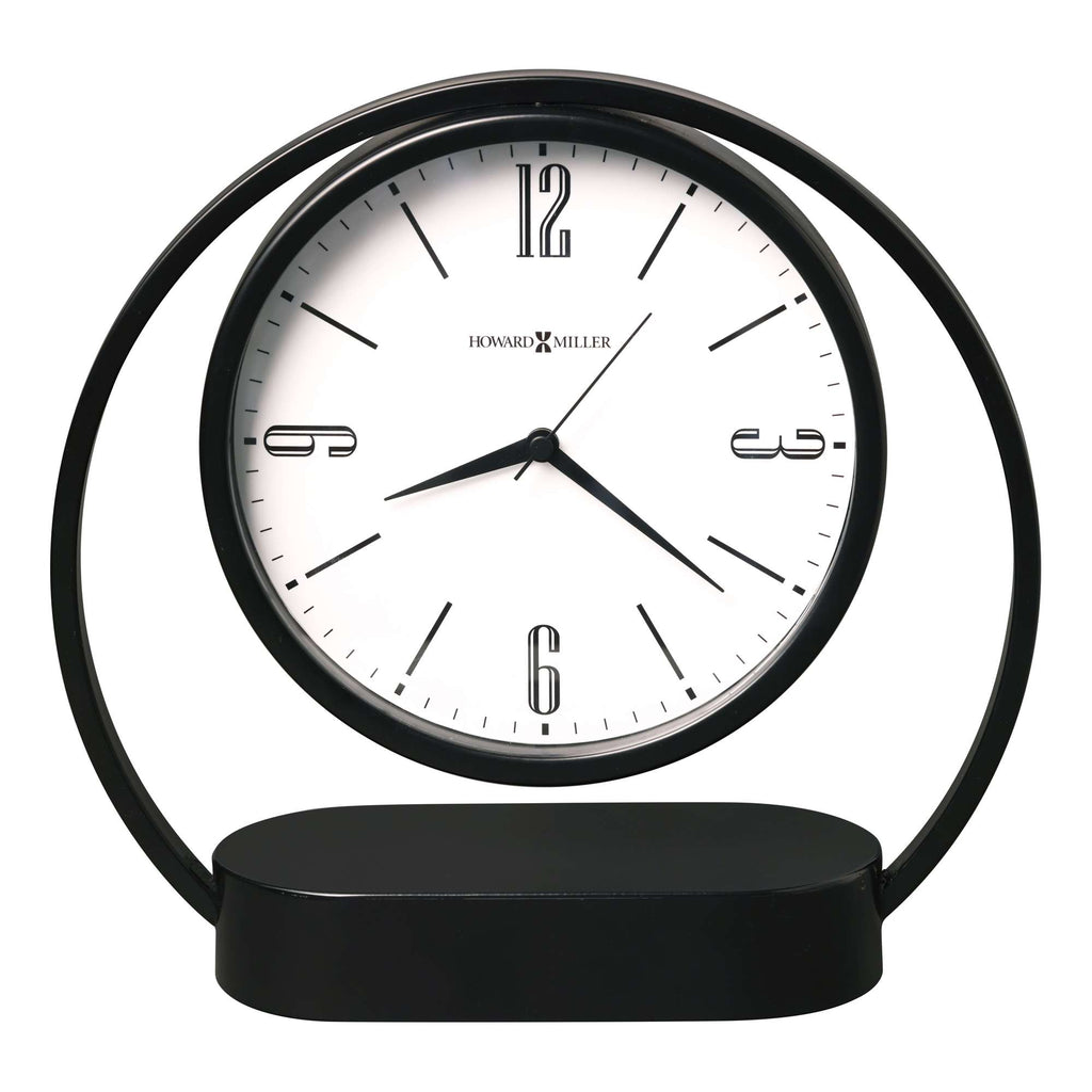 A modern black desk clock with a round face and minimalist design.