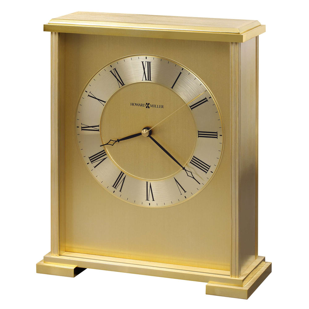A gold-colored mantel clock with Roman numerals and a simple, elegant design.