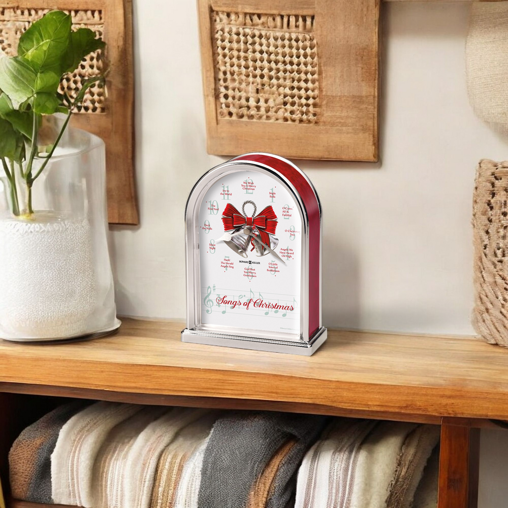 Decorative Christmas clock on a wooden shelf