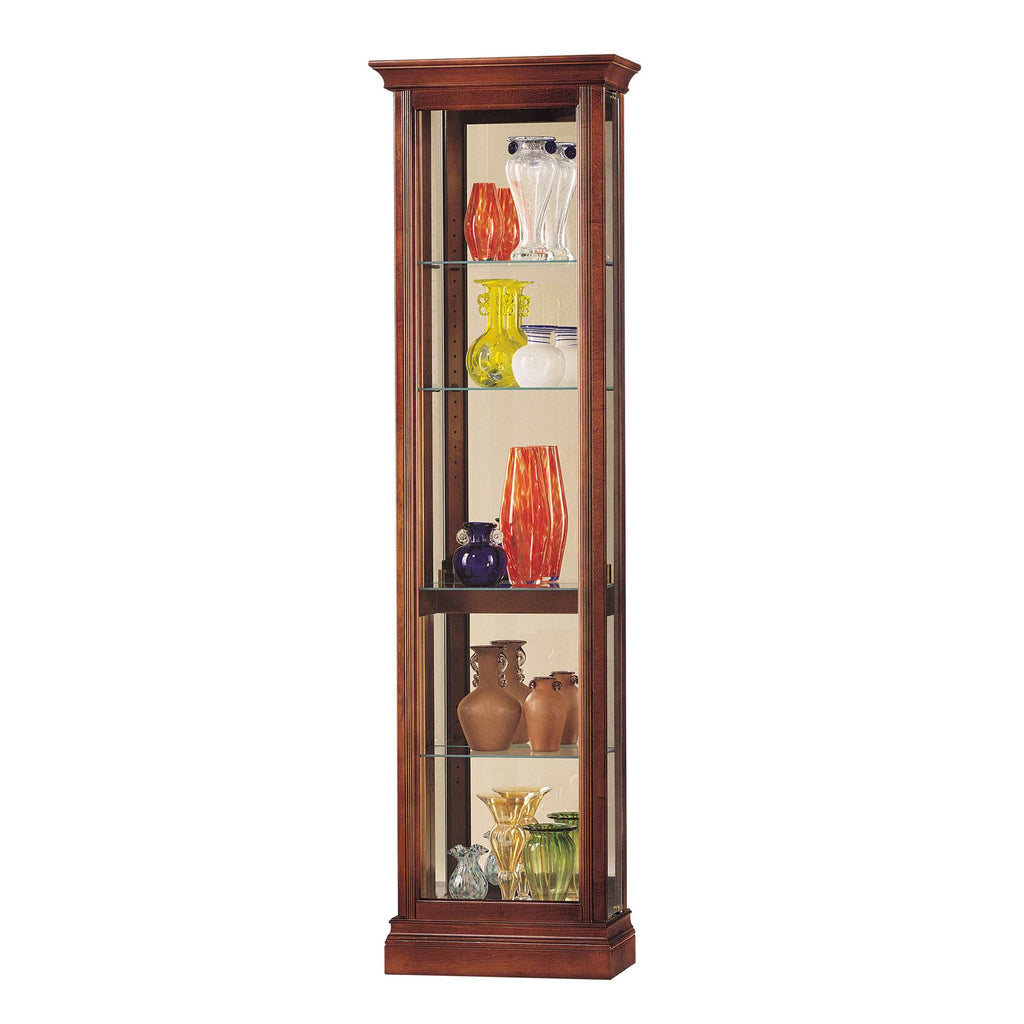 Wooden display cabinet with colorful glass vases and decorative items