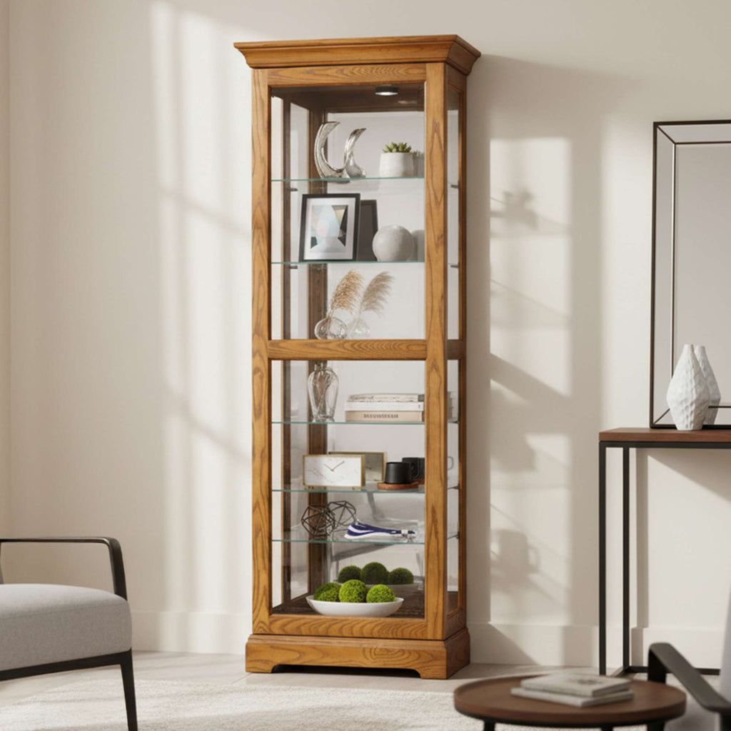 Wooden display cabinet with glass shelves and decorative items.
