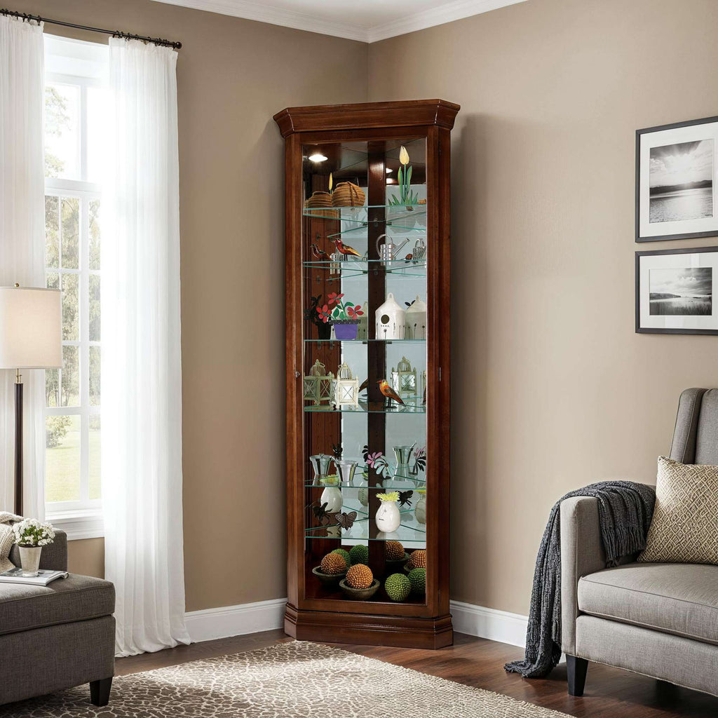 A corner display cabinet showcasing various decorative items in a well-lit living room.