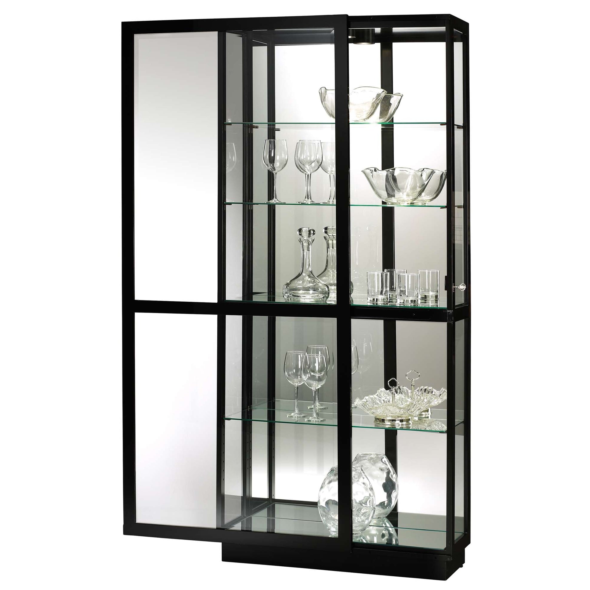 A modern glass display cabinet with black frame showcasing various glassware.
