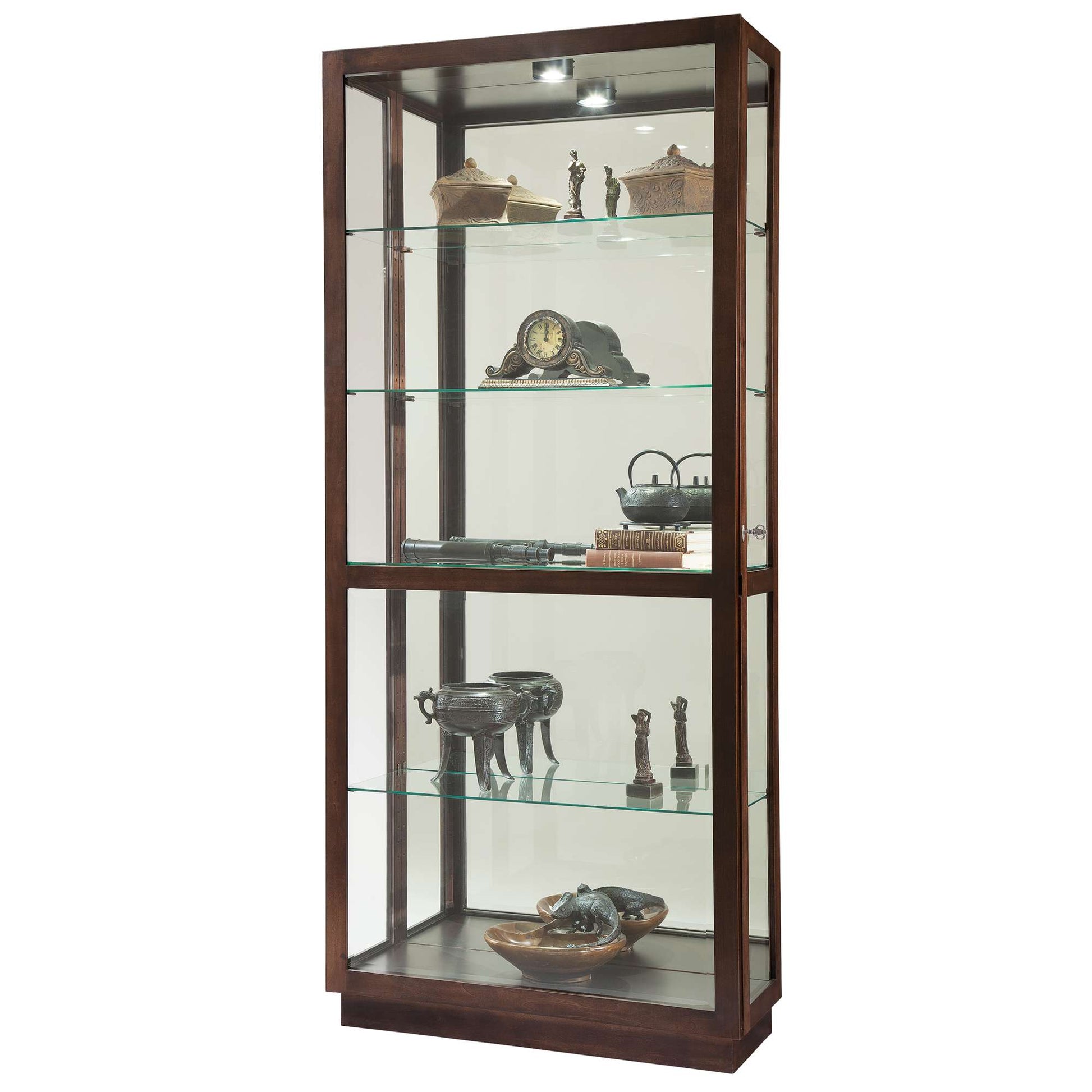 A wooden display cabinet with glass shelves showcasing various decorative artifacts.