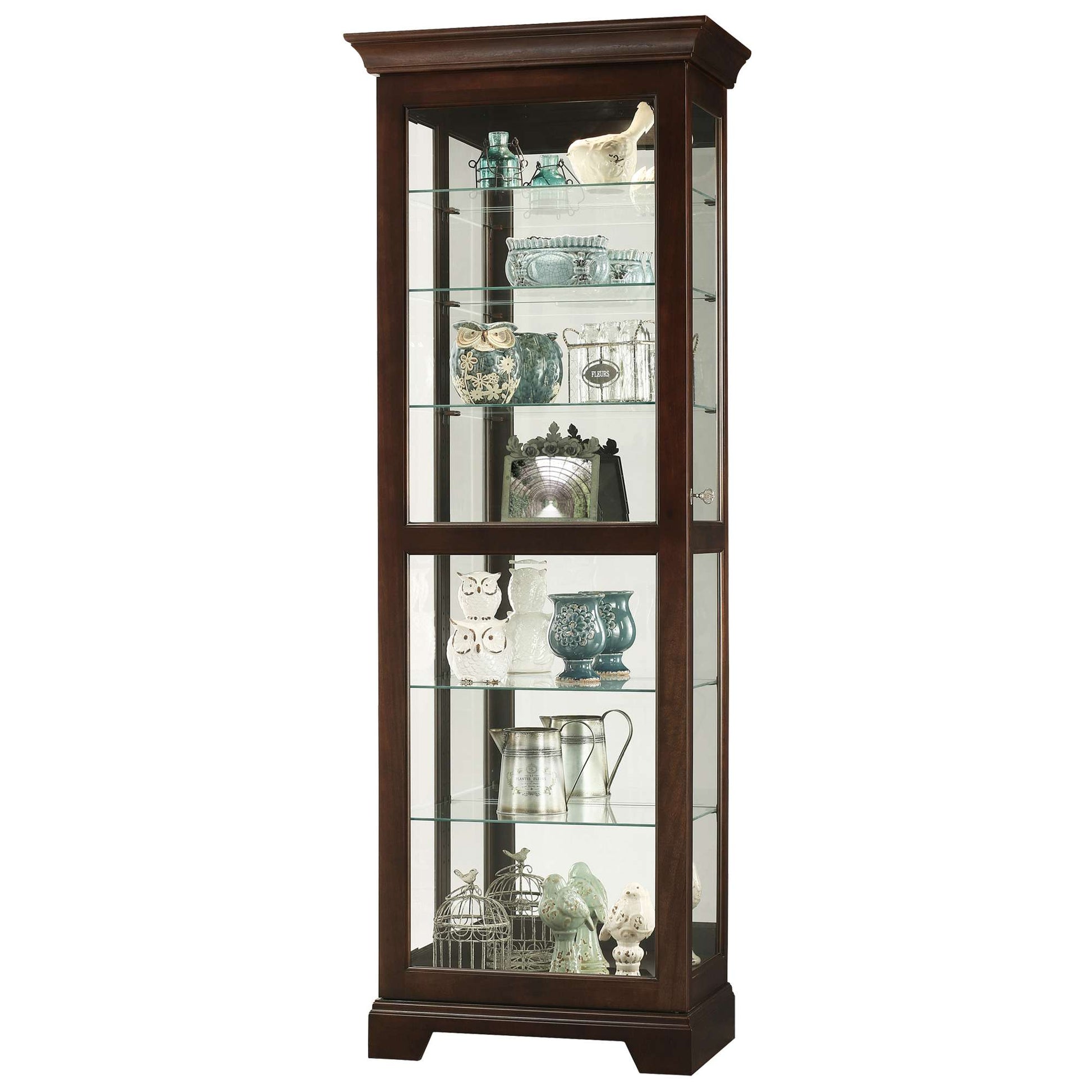 A tall wooden display cabinet with glass shelves showcasing various decorative items.