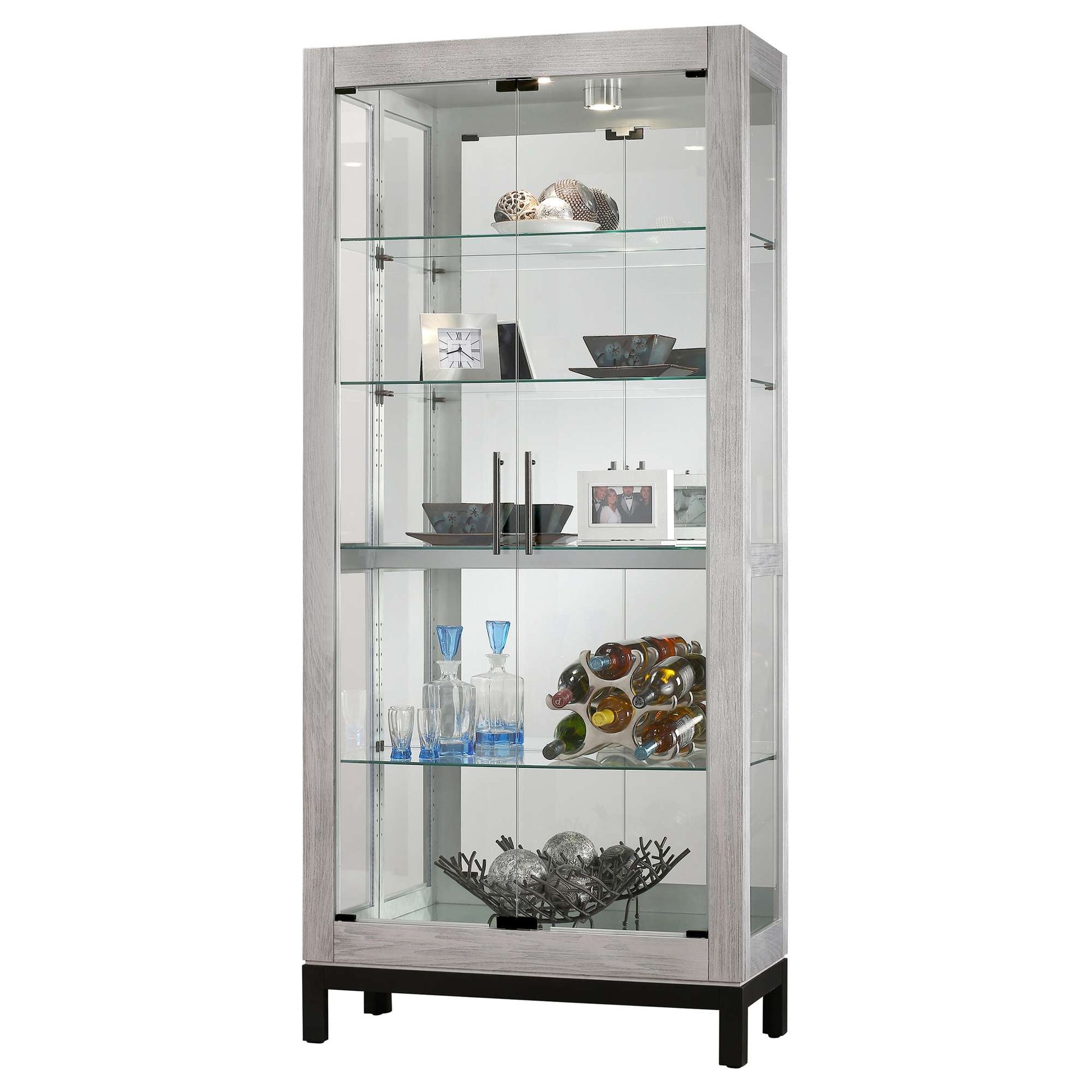 Glass display cabinet with decorative items inside