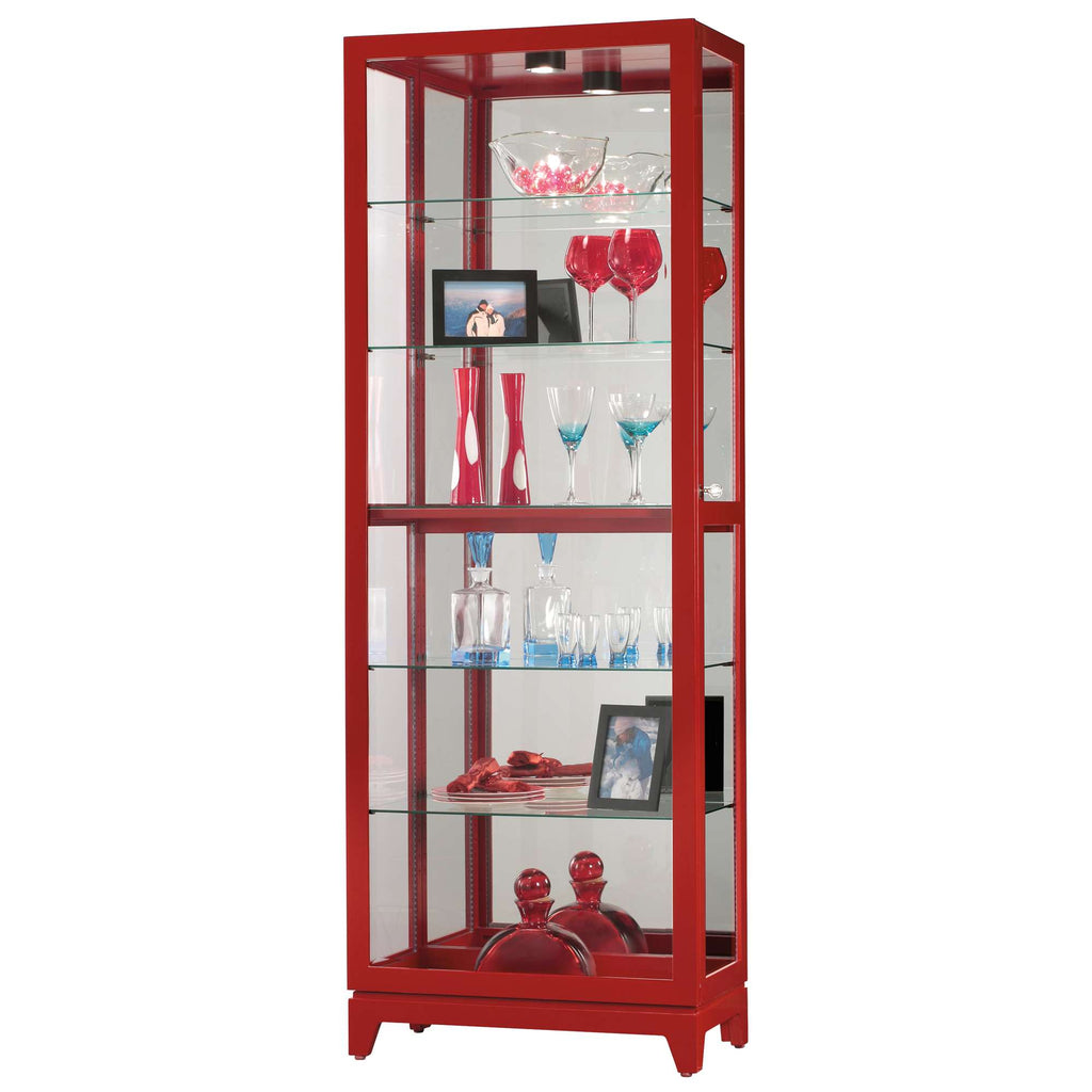 A modern red display cabinet showcasing decorative items and glassware