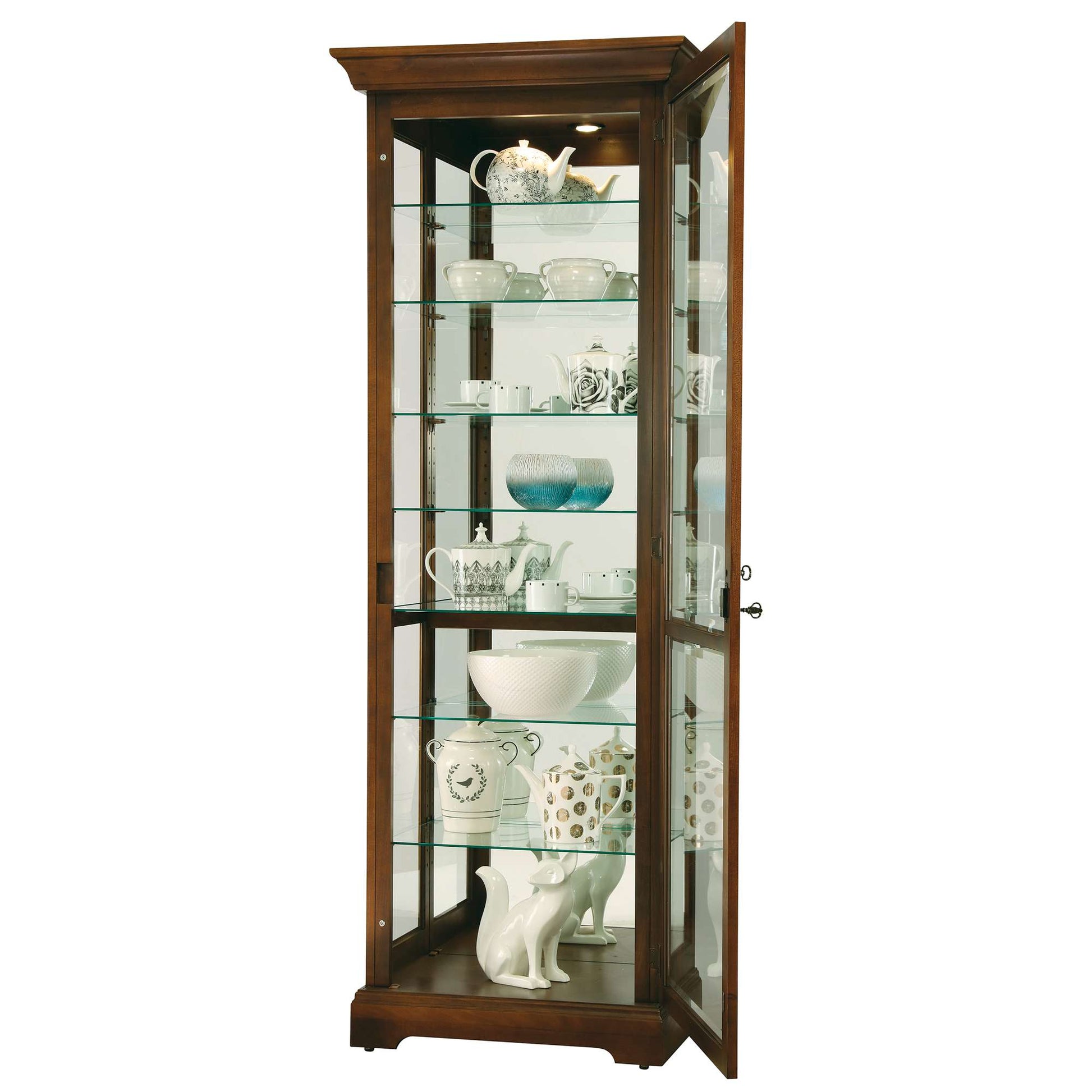 Glass display cabinet showcasing various decorative dishes and figurines