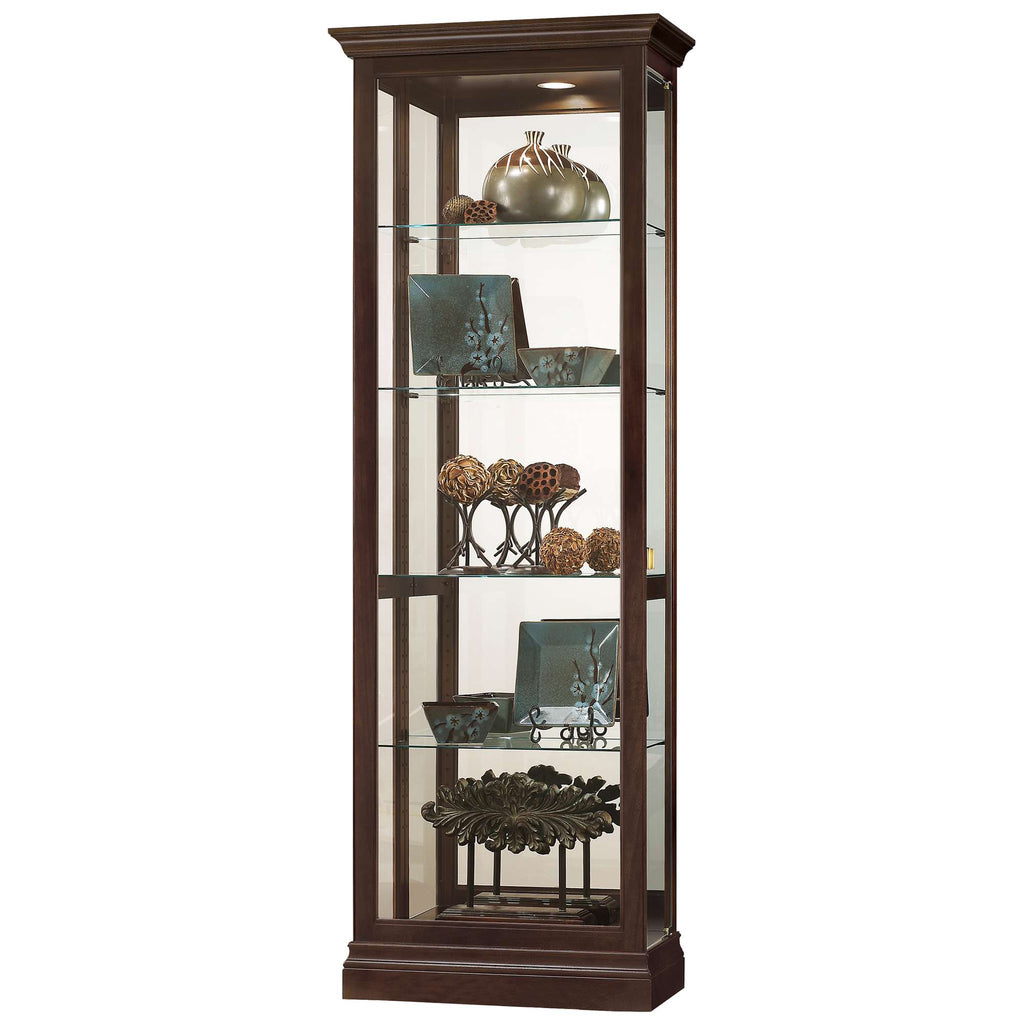 Tall wooden display cabinet with glass shelves showcasing decorative items