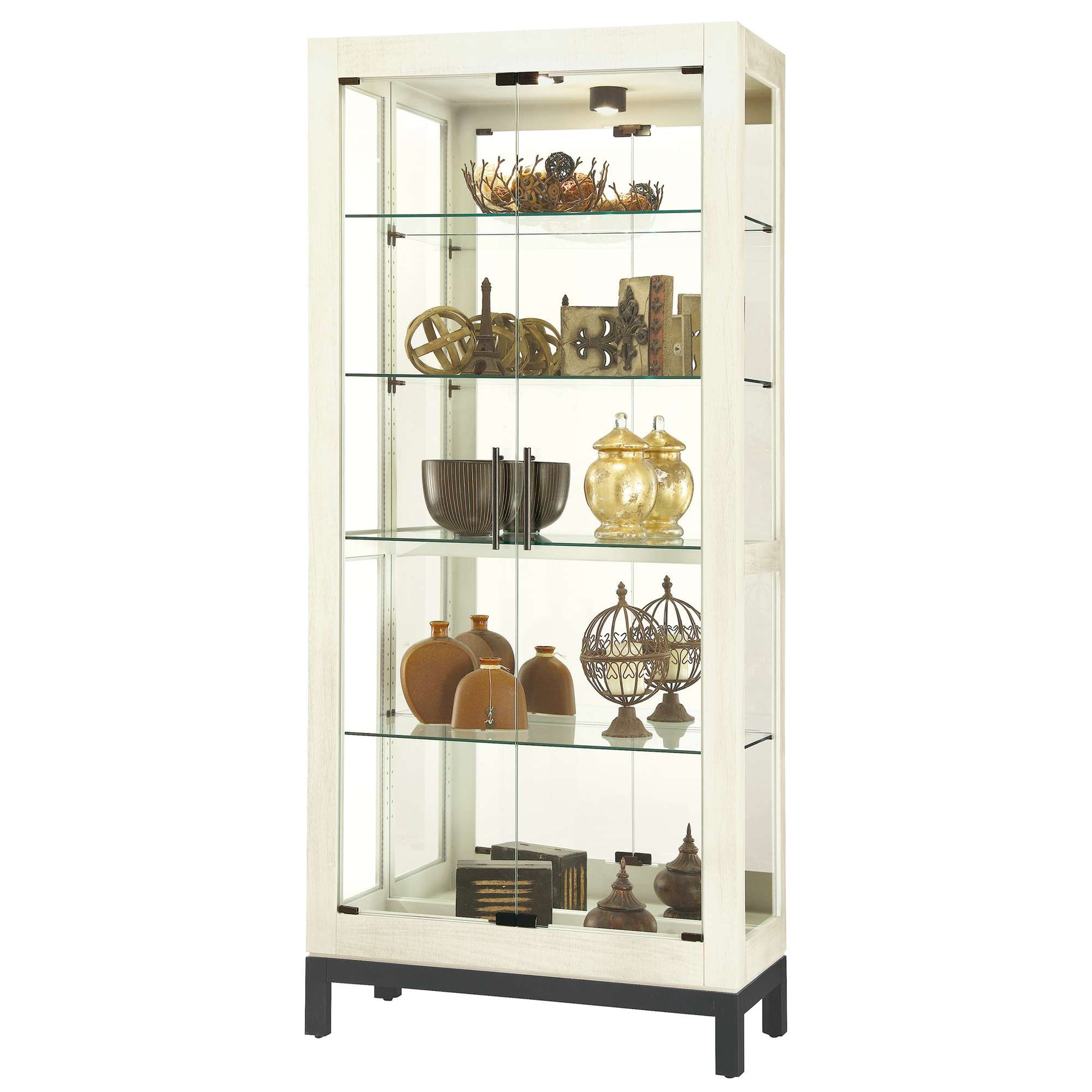Display cabinet featuring various decorative items and collectibles