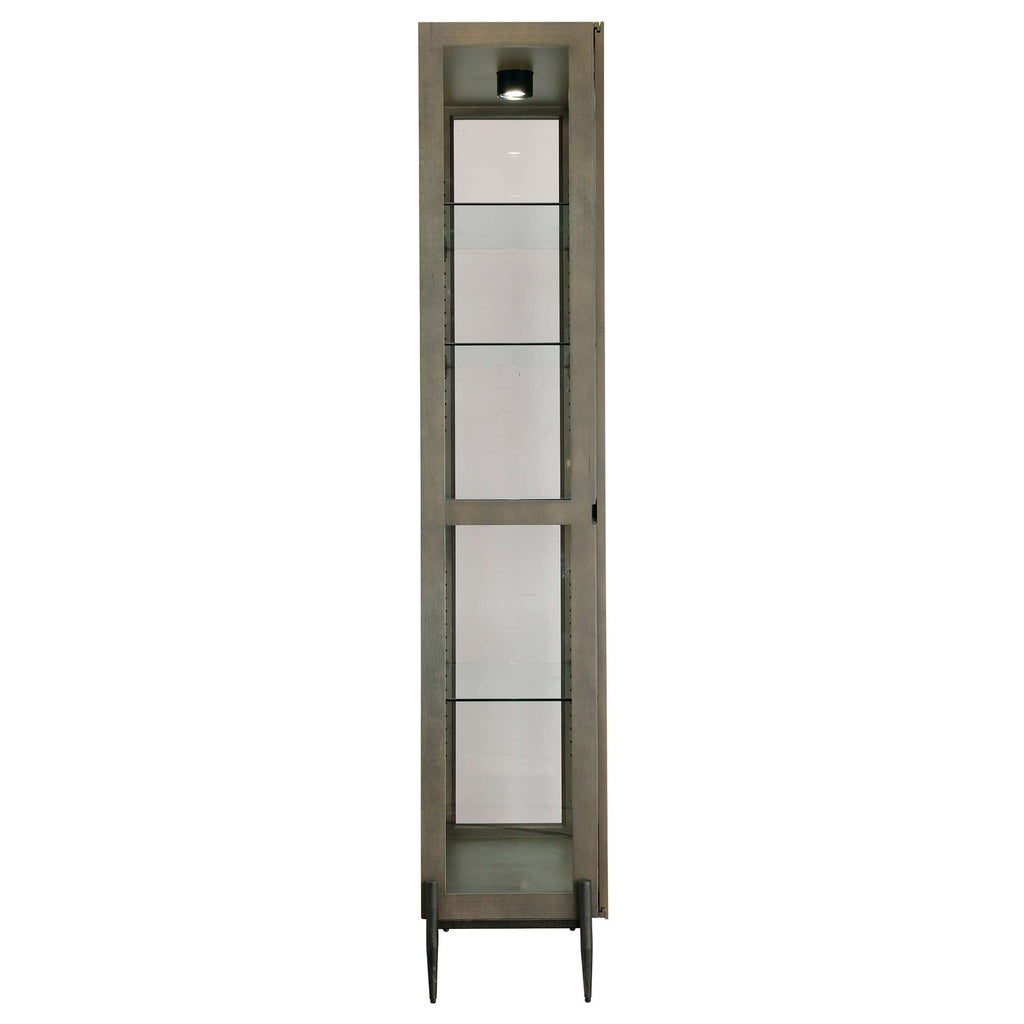 A tall, narrow display cabinet with glass shelves and a light on top.