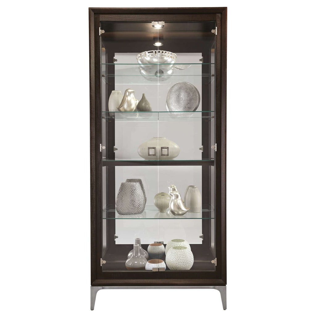 Elegant glass display cabinet showcasing various decorative objects and vases on glass shelves.