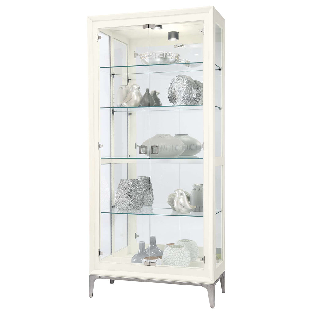 A tall, white display cabinet with glass shelves showcasing decorative vases and glassware.