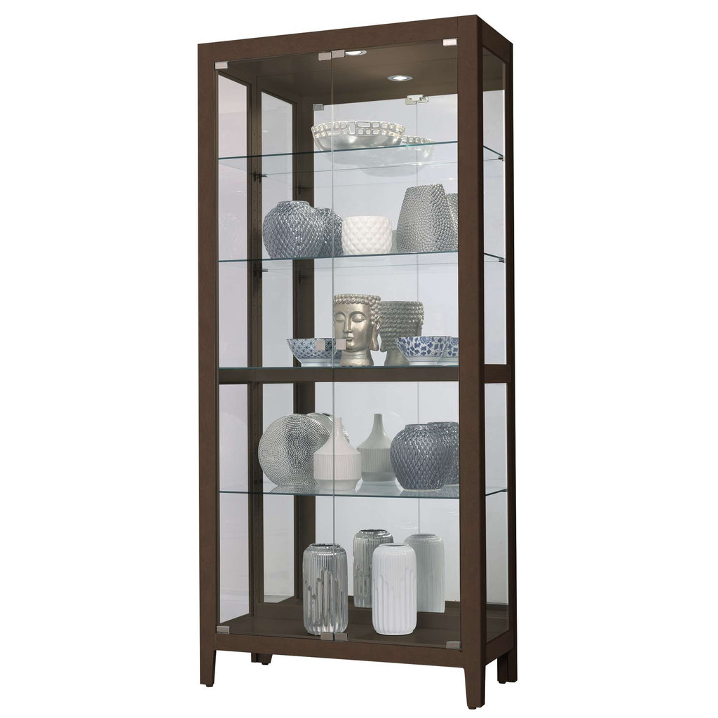 A modern display cabinet with glass shelves showcasing various decorative vases and objects.