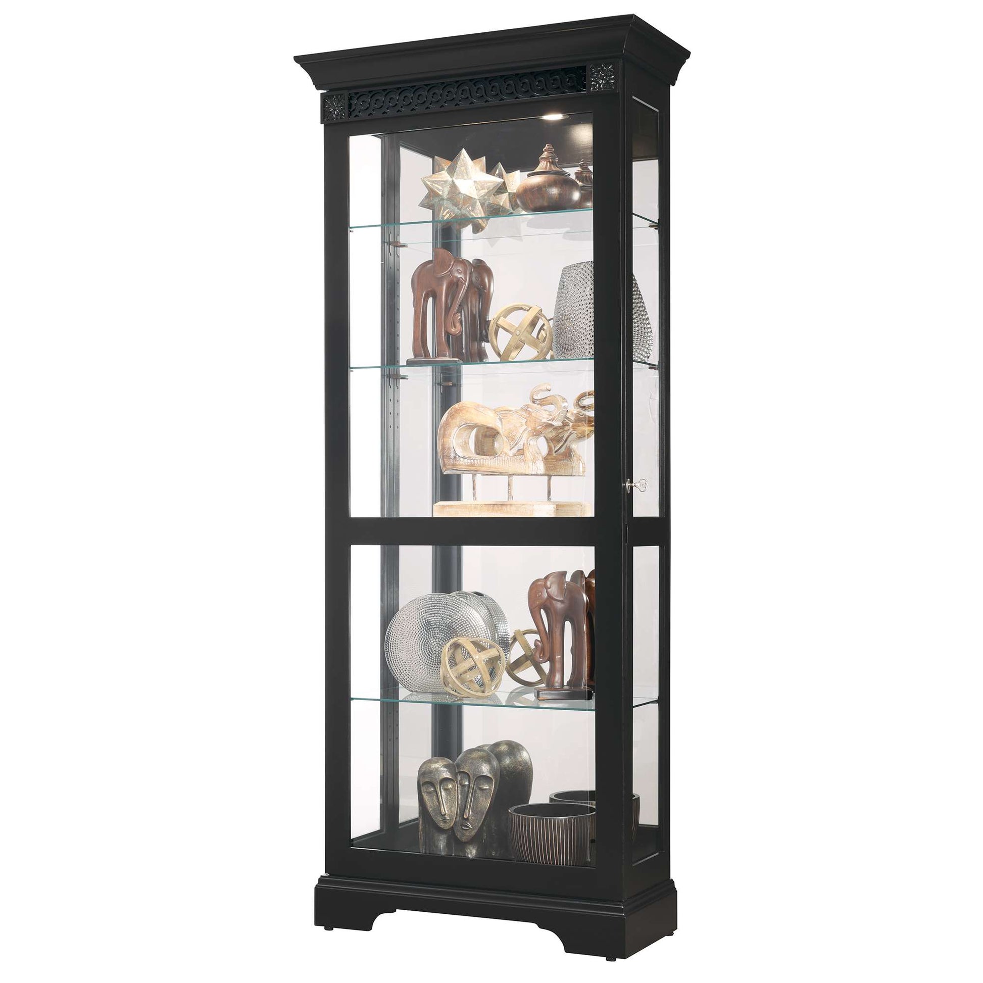 Tall black display cabinet with glass shelves showcasing various decorative items.