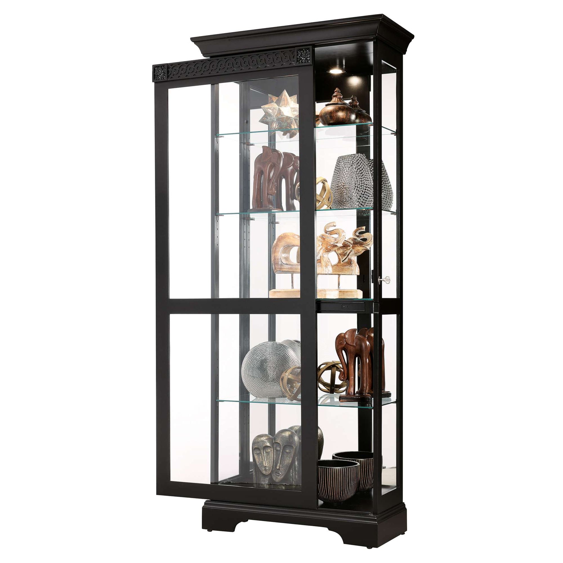 A tall black display cabinet with glass shelves showcasing various decorative items.