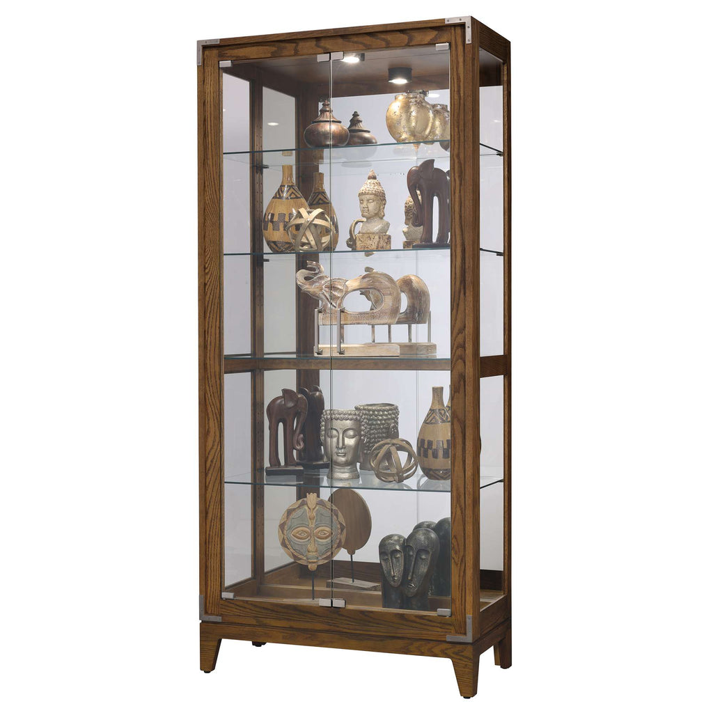 Display cabinet showcasing various decorative artifacts and sculptures.