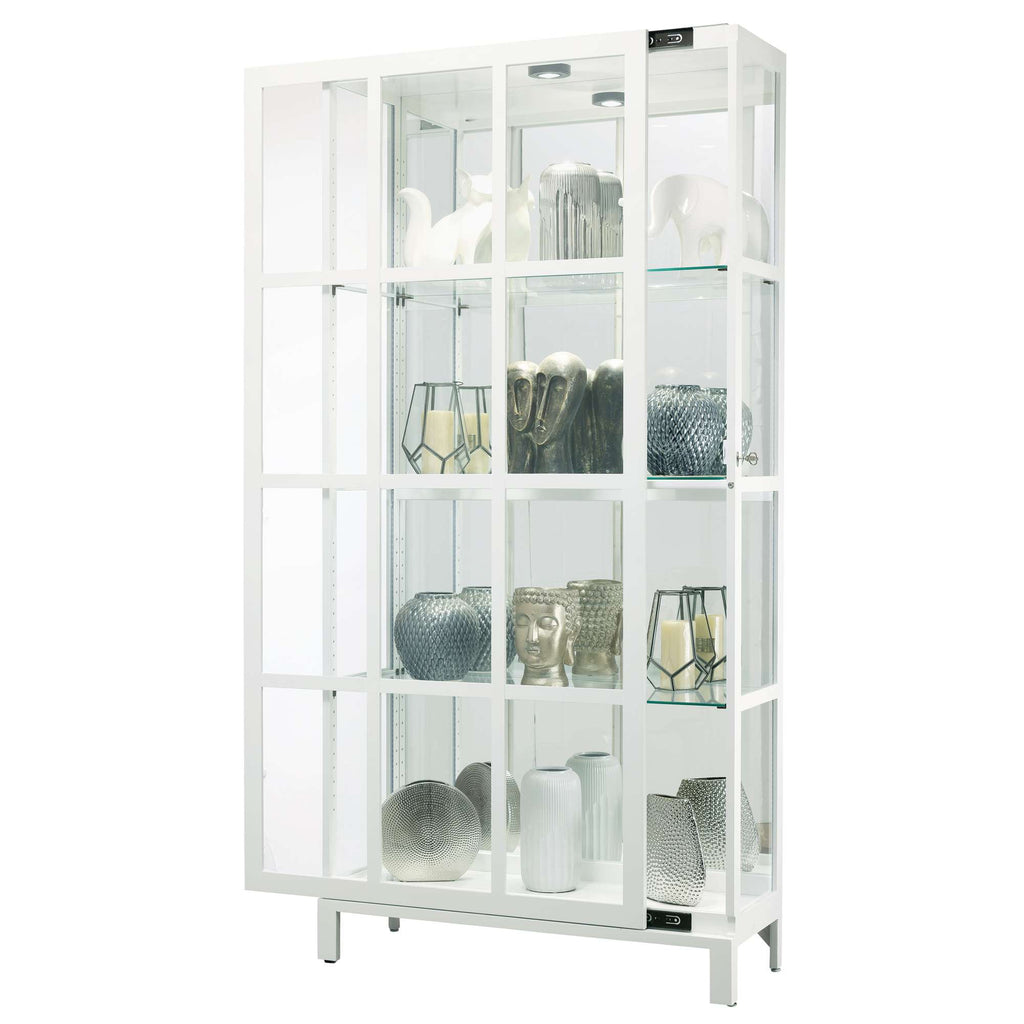White display cabinet showcasing decorative vases and glassware