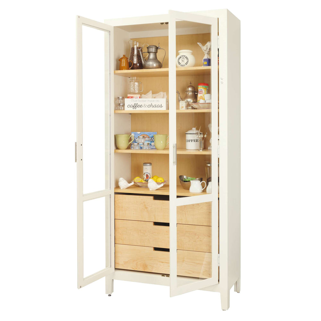 A stylish white cabinet with glass doors, showcasing decorative items and kitchenware.