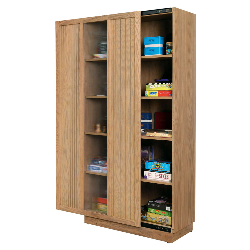 Wooden bookshelf with sliding doors and various items displayed on the shelves.