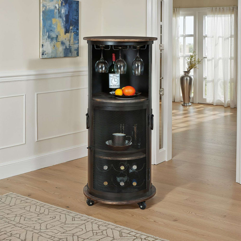 A stylish bar cart with wine bottles, glasses, and fruits in a well-lit room.