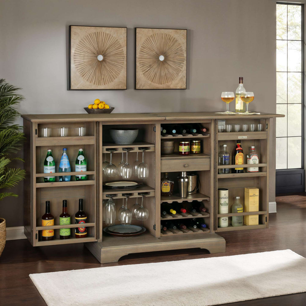 A stylish home bar cabinet with various bottles, glasses, and decorative items.