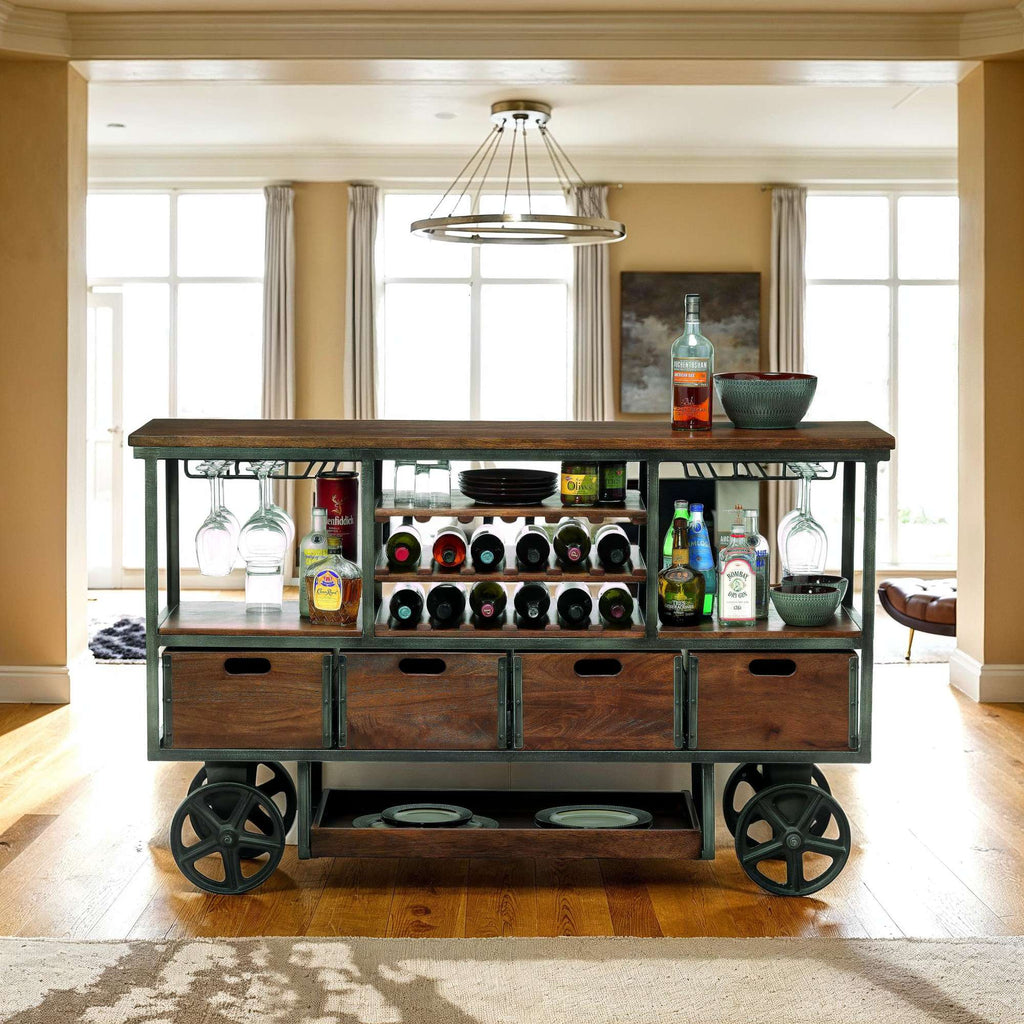 A stylish bar cart with a wooden top, displaying various bottles and glasses, set in a well-lit room with large windows.