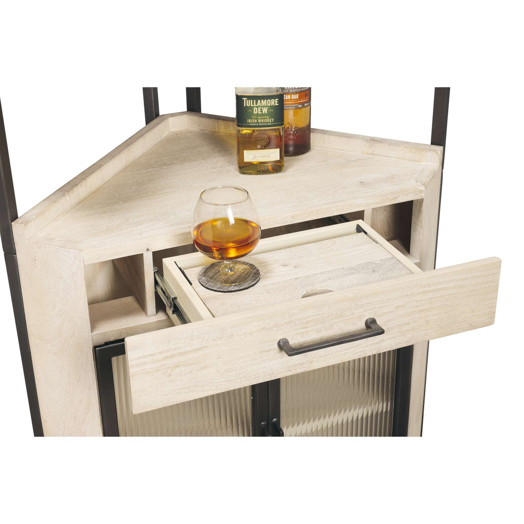 A modern wooden cabinet featuring an open drawer with a drink and a coaster, along with bottles on top.