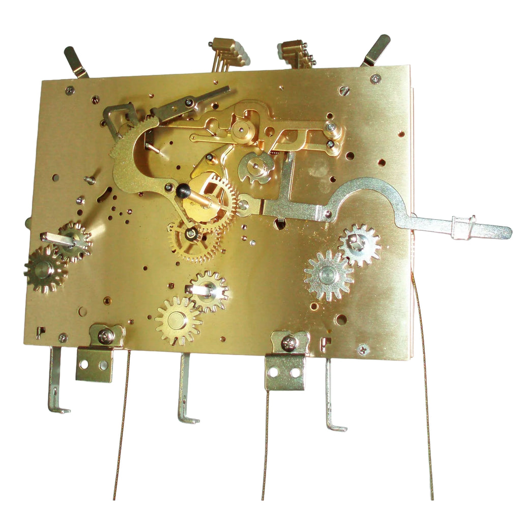 Gold metal mechanical clock movement with intricate gears and components for home décor or clock repair.