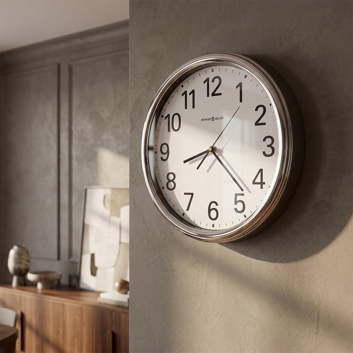 Wall clock on a textured wall with a neutral color scheme