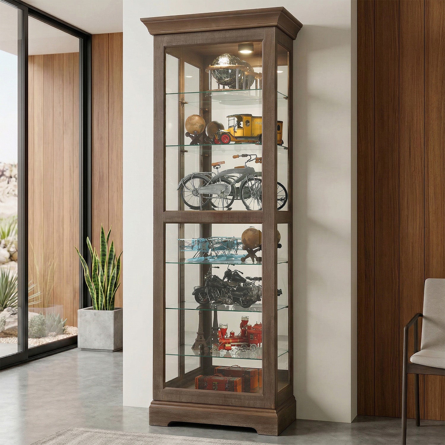 Wooden display cabinet with glass doors filled with decorative items in a modern room.