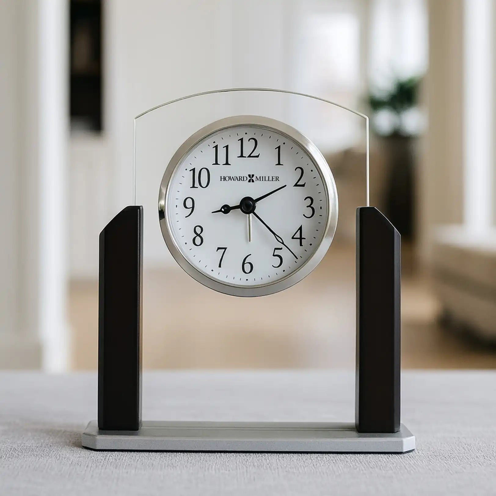 Modern desk clock with a glass arch and wooden supports