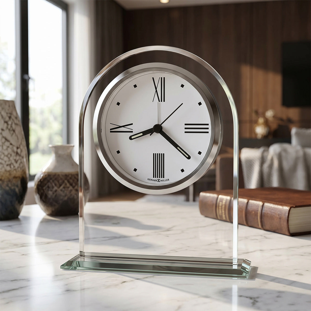 A modern, stylish tabletop clock with a glass base and a white roman numeral face.