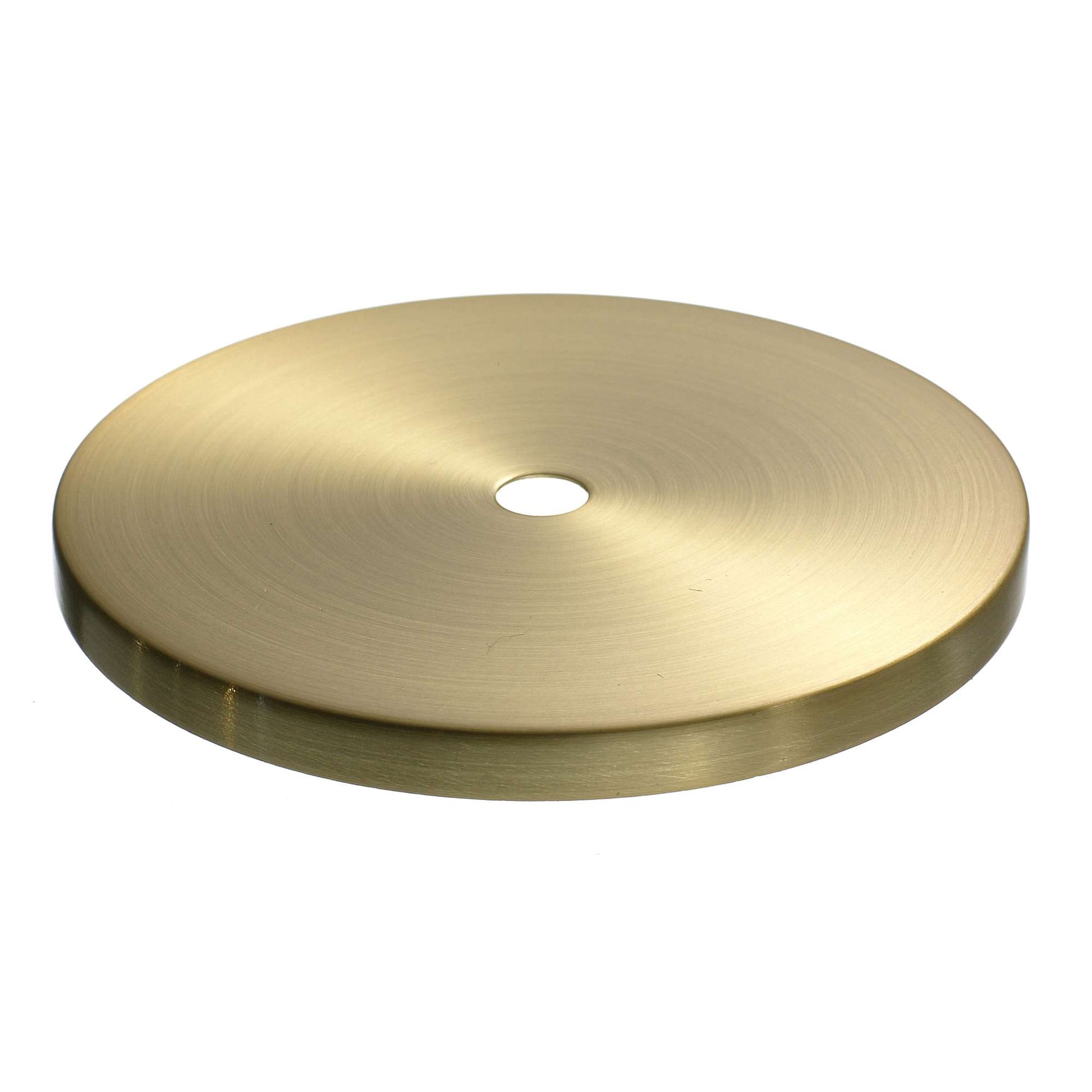 A flat circular brass disc with a central hole.