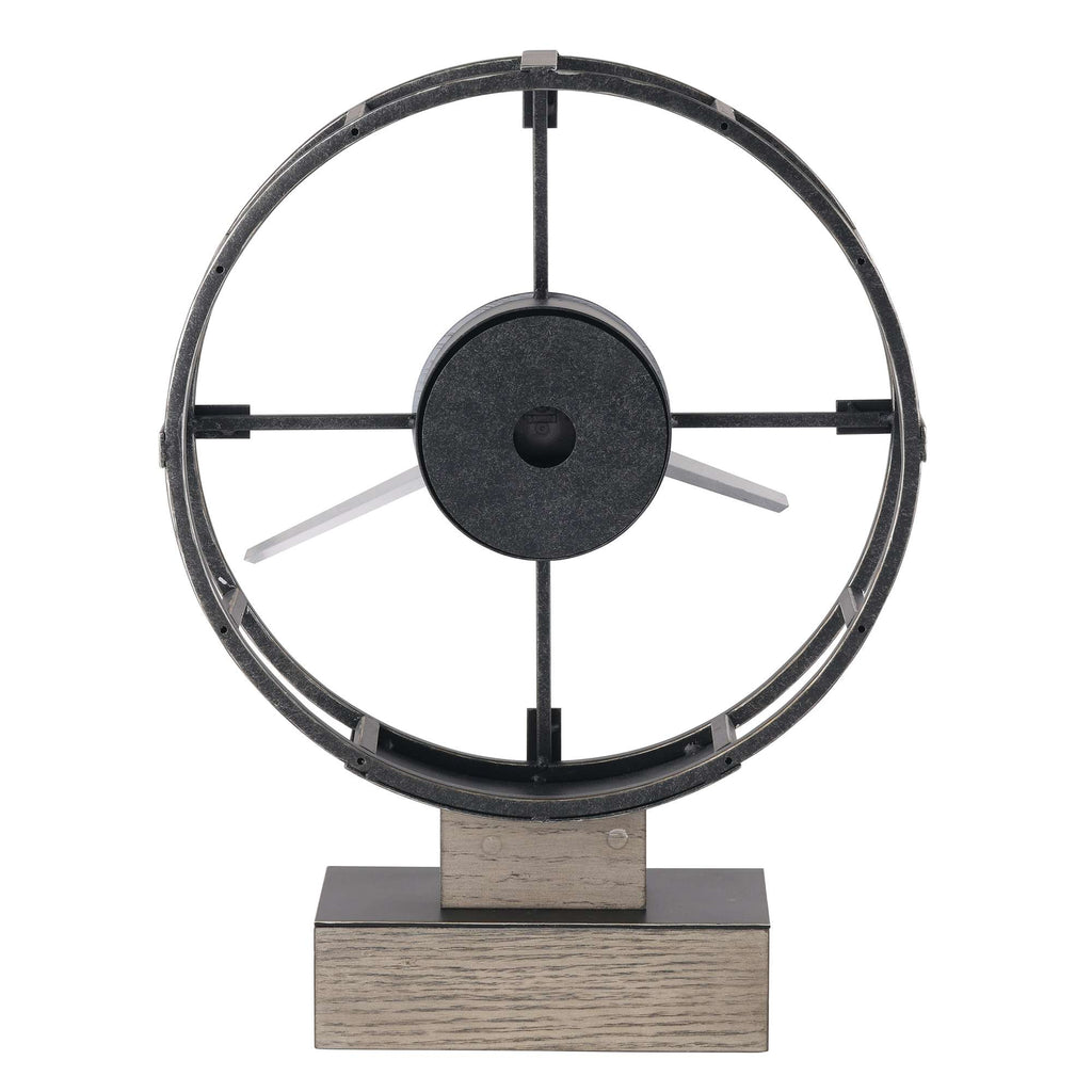 A decorative model of a vintage aircraft propeller mounted on a wooden base.