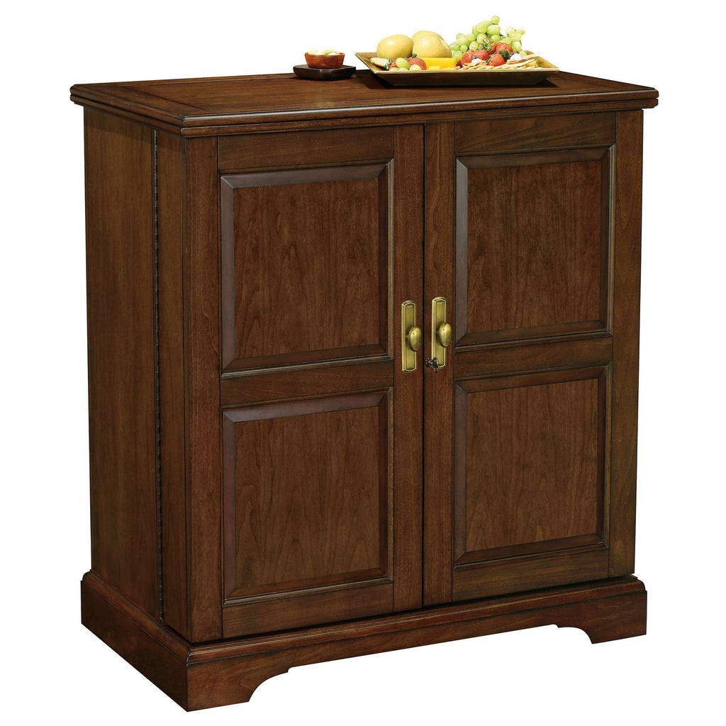 Wooden cabinet with two doors and a decorative top display of fruit.