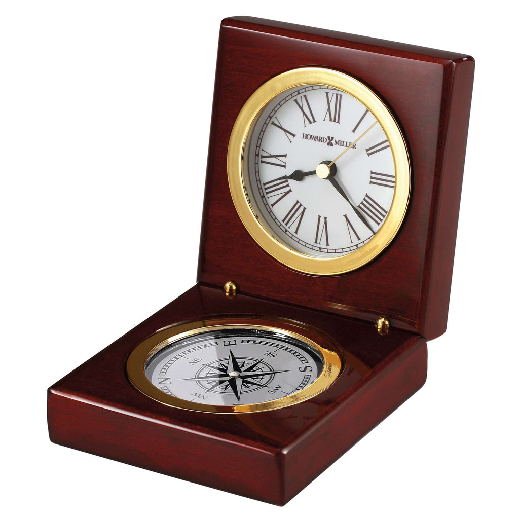 Wooden desk clock with a compass in an opened case
