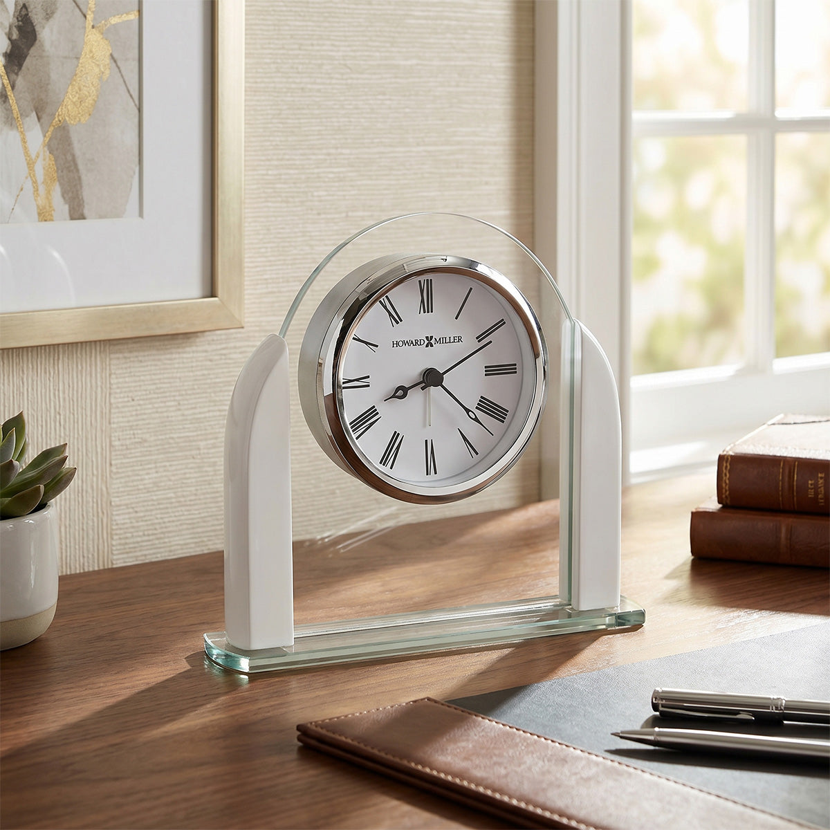 Decorative clock on a desk with a window in the background