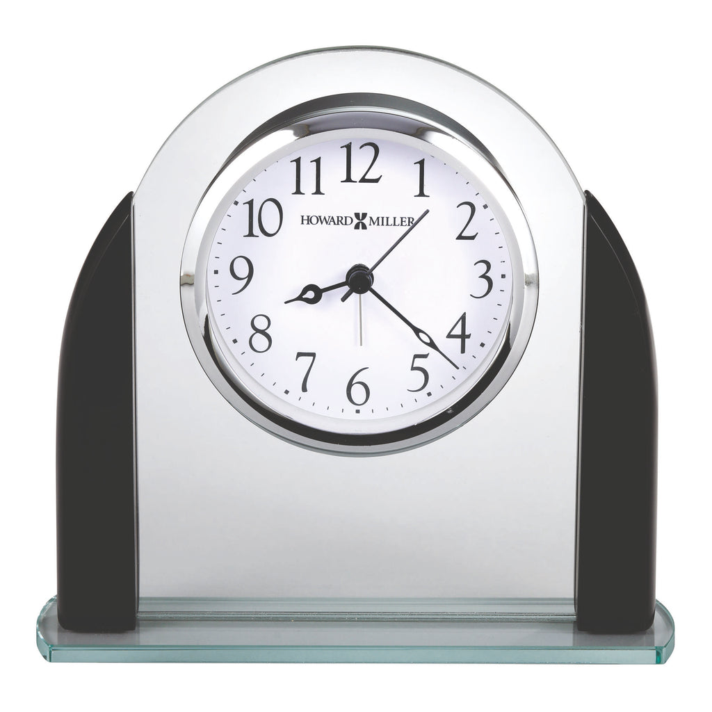 A decorative desk clock with a silver frame and black accents.