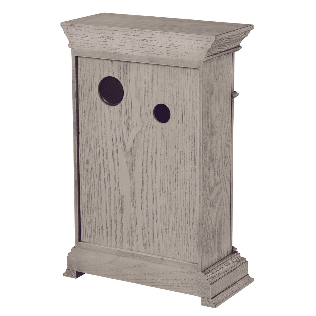 Wooden box with two circular holes, resembling a decorative storage unit.