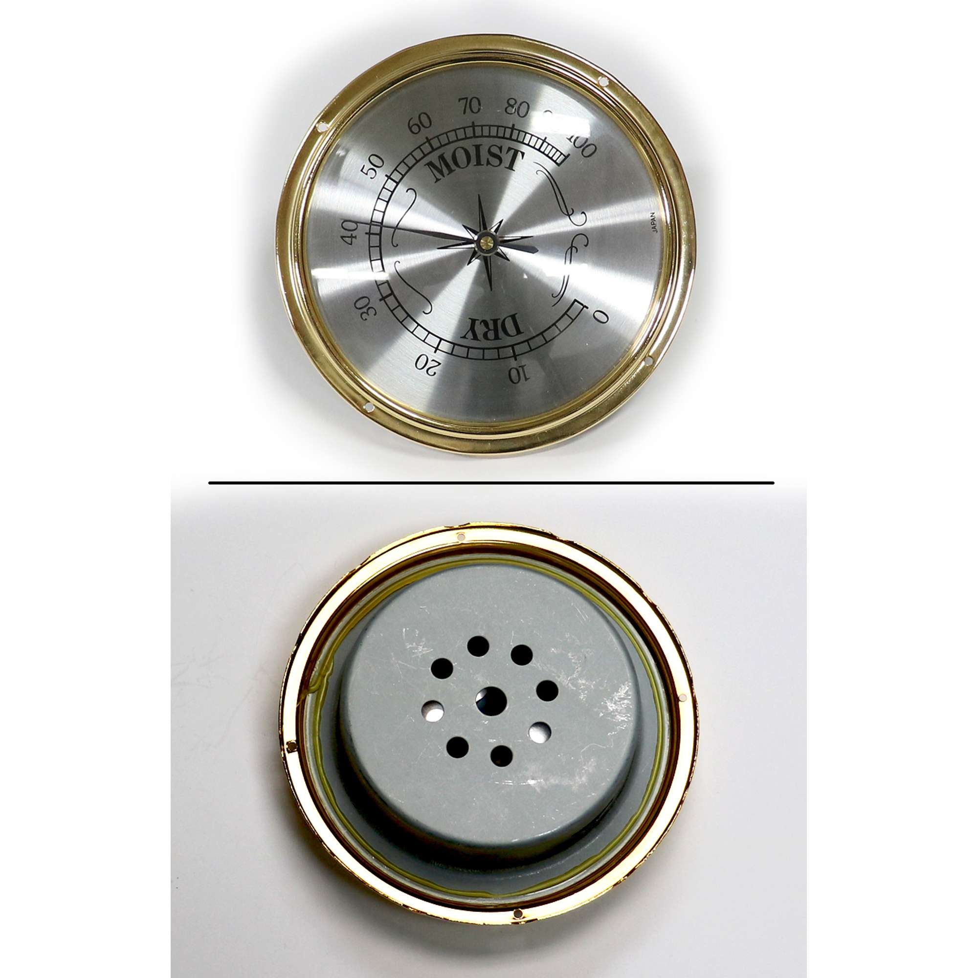 Metal humidity and moisture gauge with a circular dial