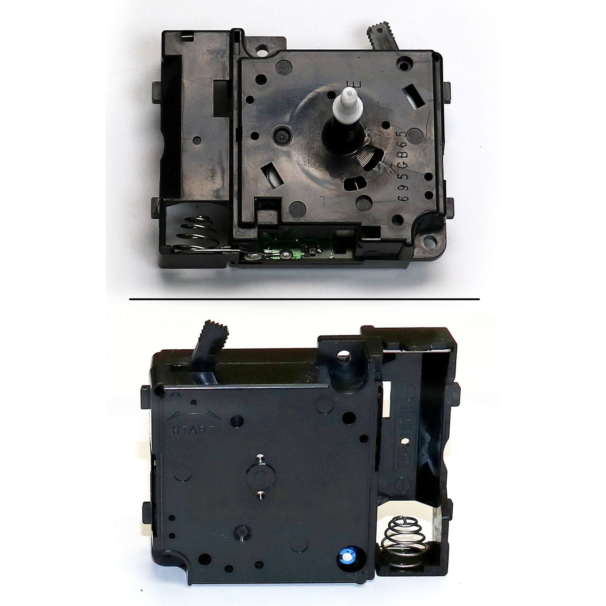 Black electronic mechanism with a rotating knob and internal components