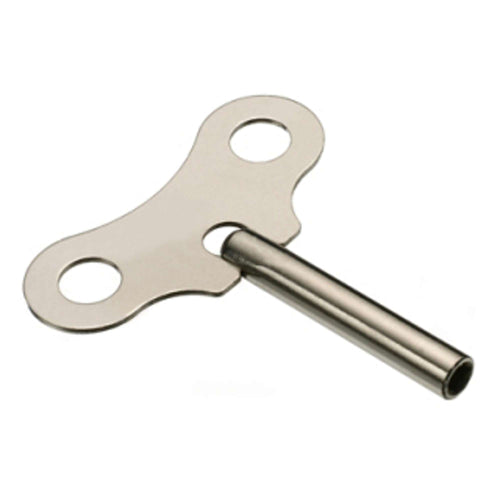 A metallic wind-up key with a T-shaped handle and two holes.