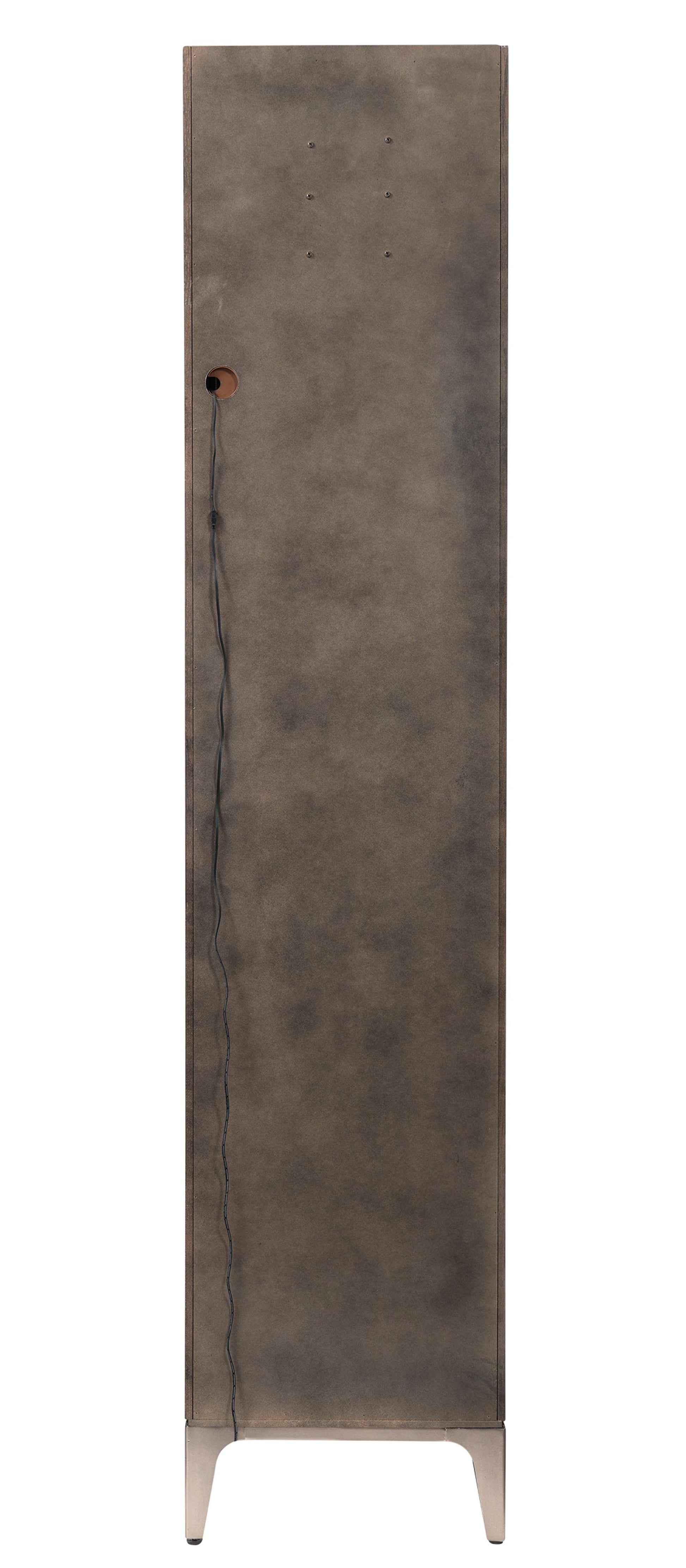 Tall, narrow cabinet with a textured surface and a visible power cord