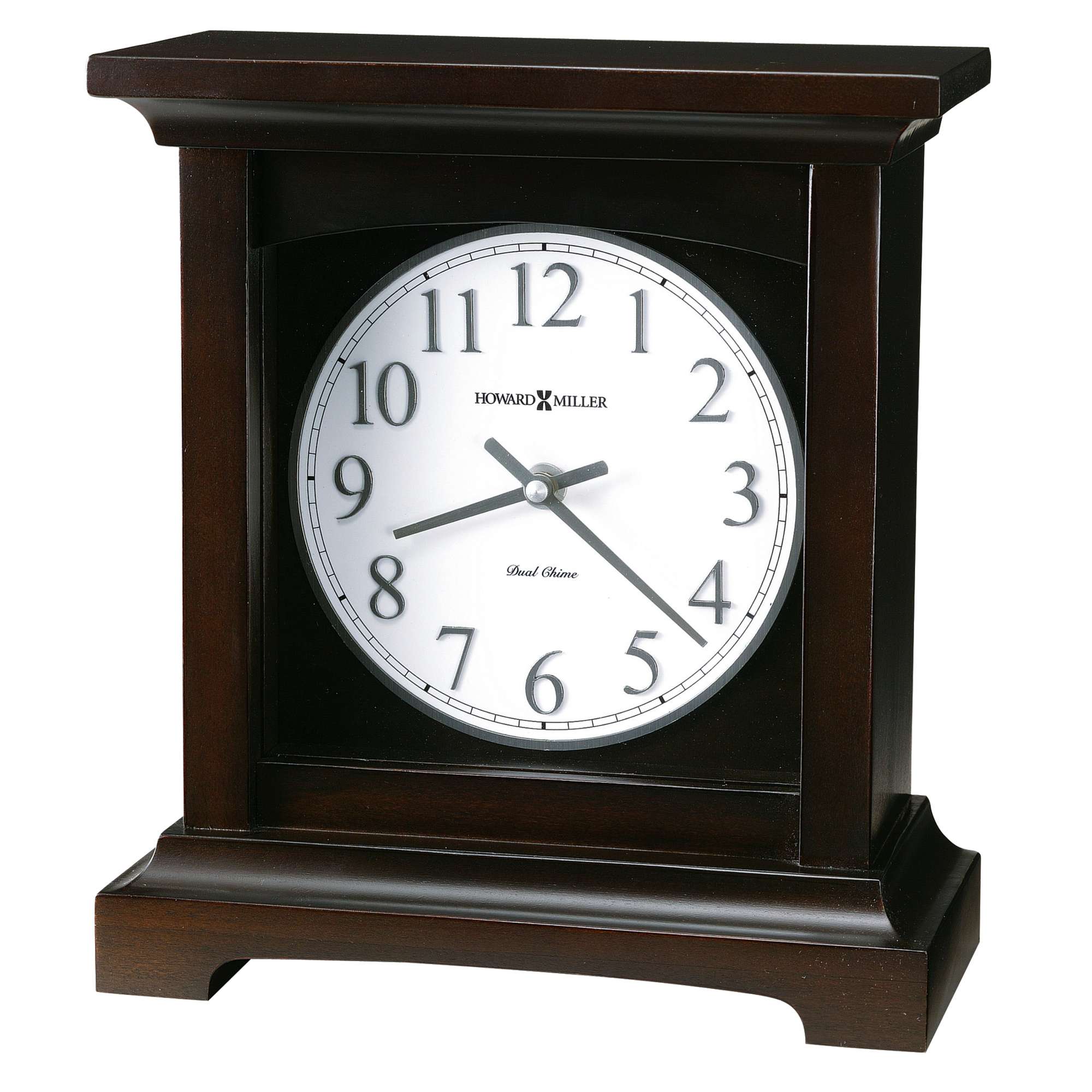 Wooden mantel clock with a white face and black numbers