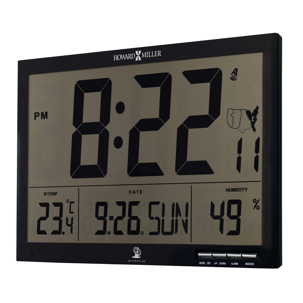 Digital wall clock displaying time, date, temperature, and humidity