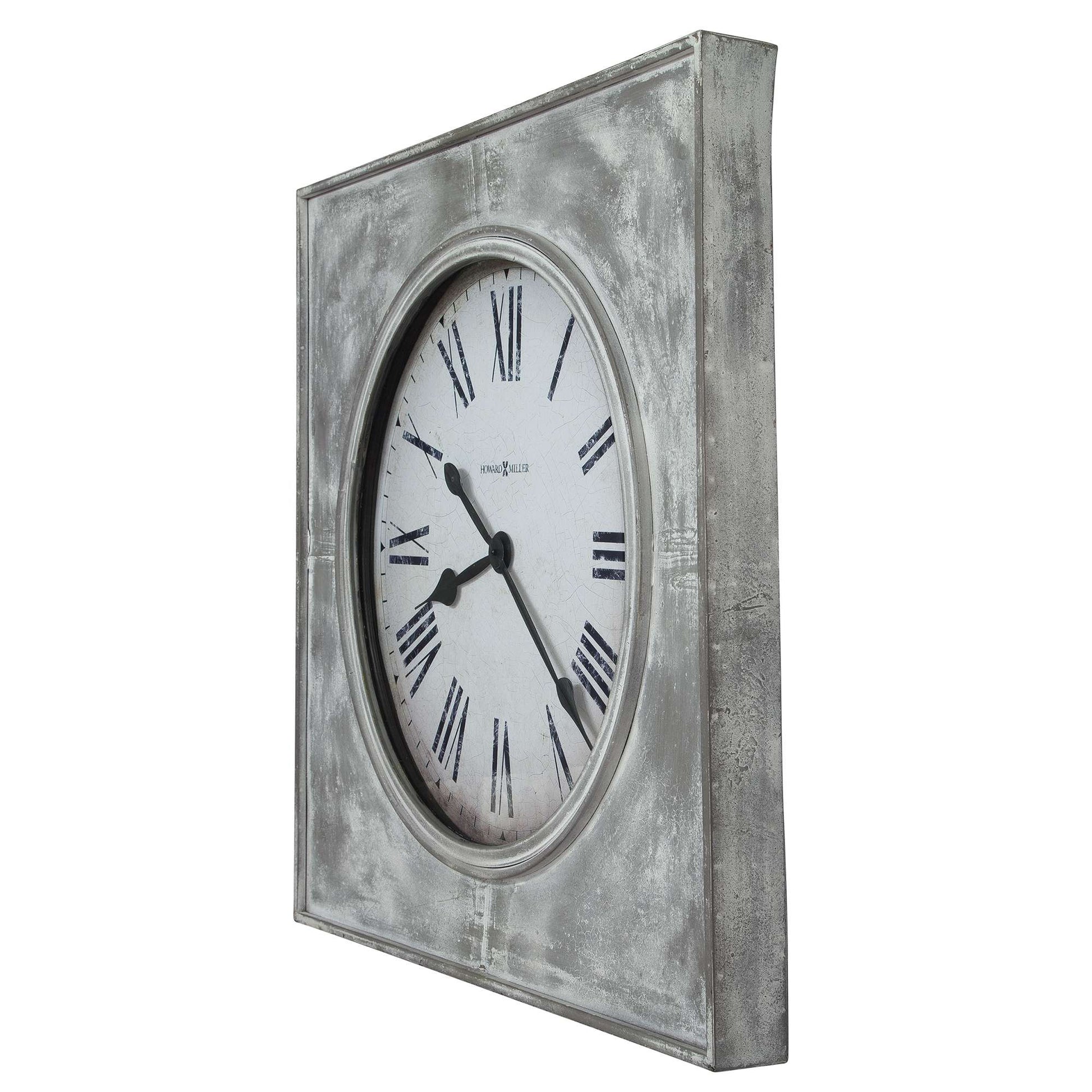 A vintage-style wall clock with Roman numerals and a distressed silver frame.