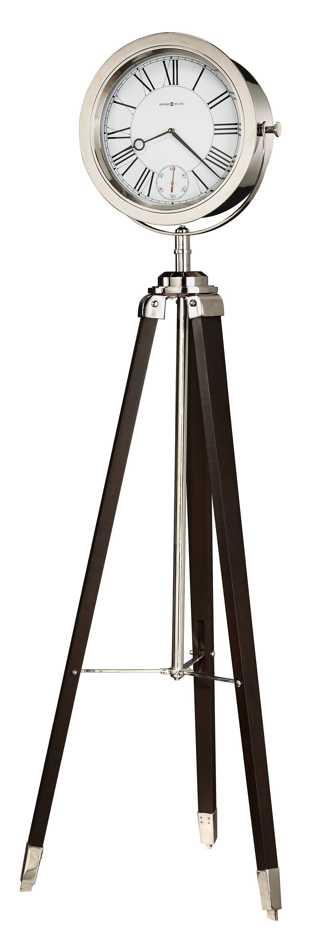 A stylish floor clock with a round face and Roman numerals, mounted on a wooden tripod stand.