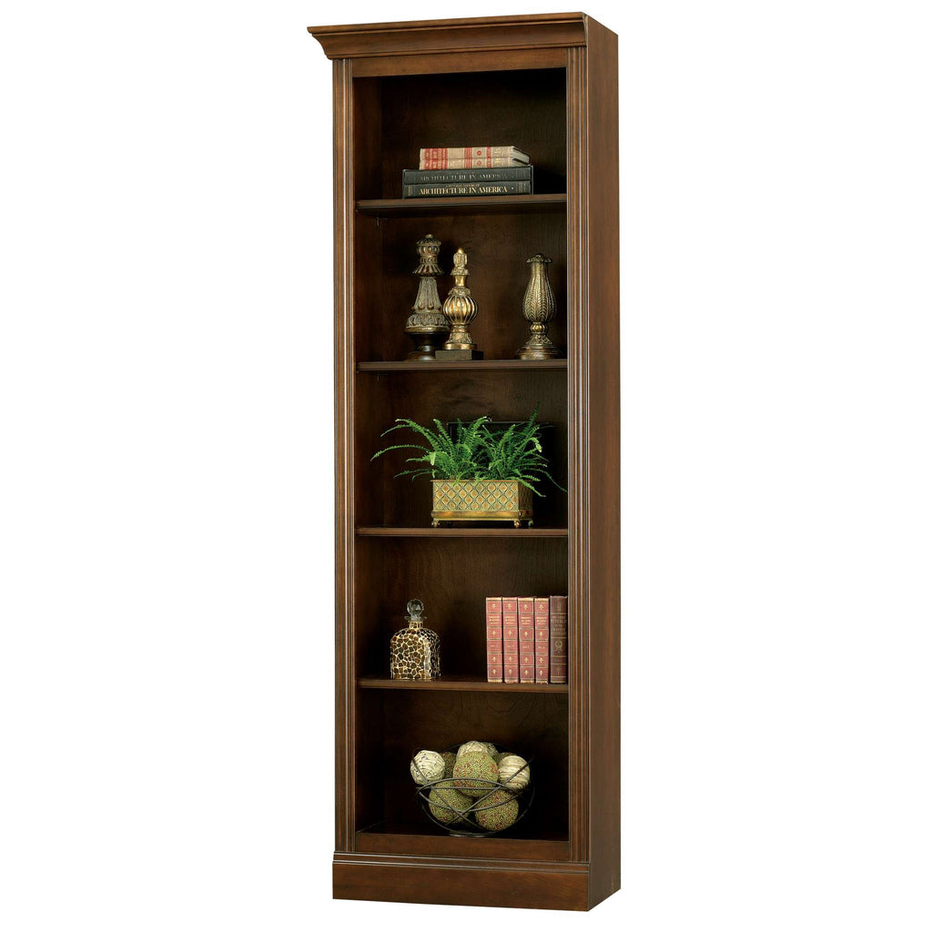 Tall wooden bookshelf with decorative items and plants