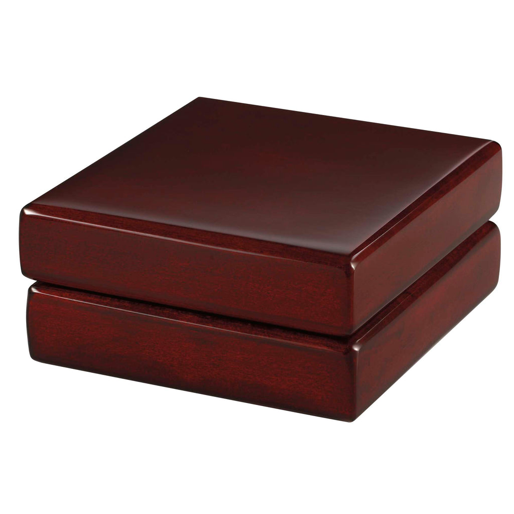 Stacked dark wood boxes with a smooth finish